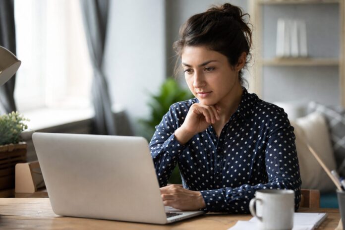 lead generation for small business owner reviewing CRM pipeline data - Automated Sales Machine